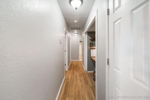 hall featuring light wood-type flooring