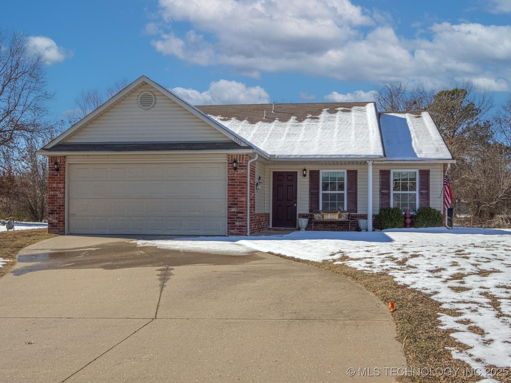 view of front of home with a garage