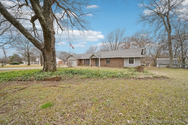 view of front of property with a front lawn