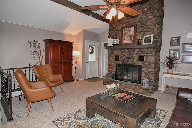 living room with a stone fireplace, ceiling fan, light carpet, and lofted ceiling with beams