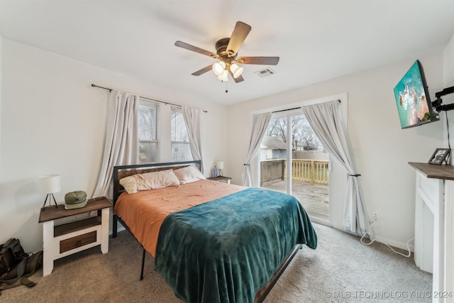 bedroom with ceiling fan, carpet floors, access to outside, and multiple windows