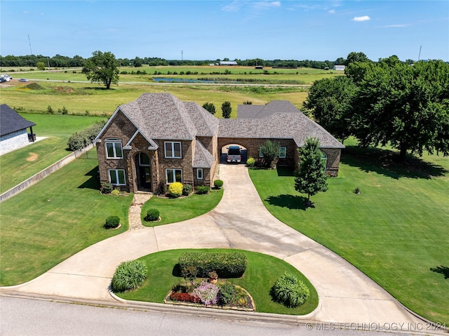 view of front of house with a front lawn