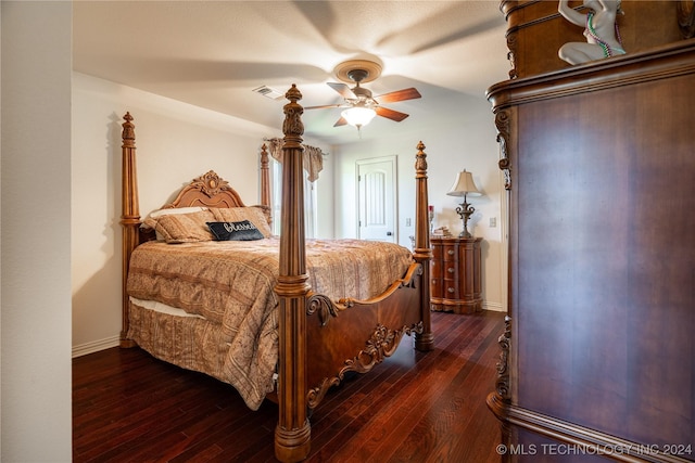 bedroom with ceiling fan and dark hardwood / wood-style floors