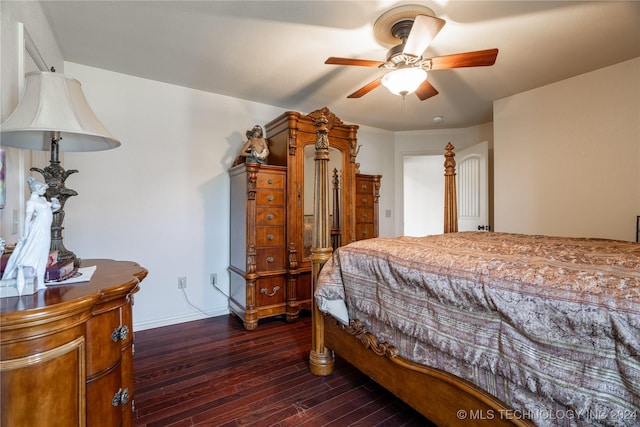 bedroom featuring ceiling fan and dark wood-type flooring