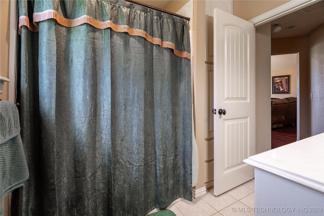 bathroom with tile patterned flooring