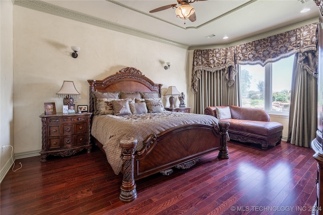 bedroom with ceiling fan, crown molding, and dark wood-type flooring