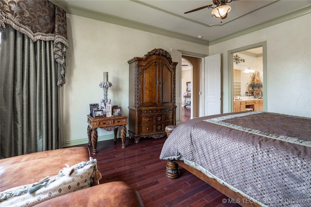 bedroom featuring ceiling fan, wood-type flooring, crown molding, and ensuite bath