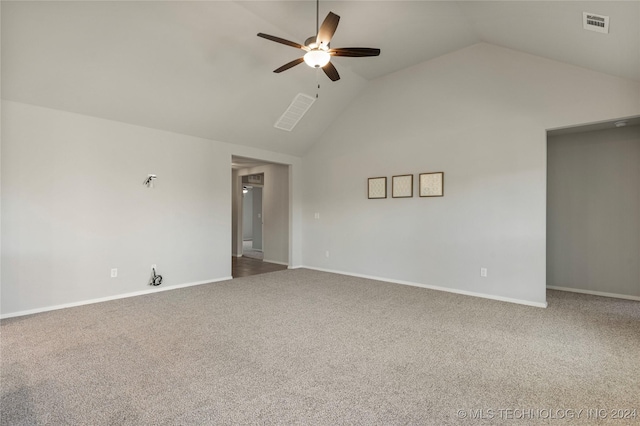 unfurnished room featuring ceiling fan, carpet, and lofted ceiling