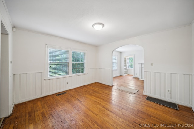 spare room featuring hardwood / wood-style floors