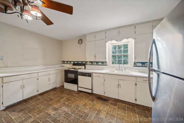 kitchen with white cabinets, ceiling fan, white appliances, and sink