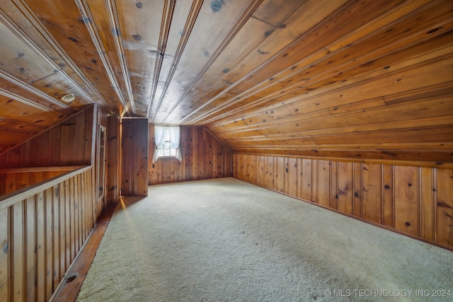 bonus room featuring carpet, vaulted ceiling, wood walls, and wood ceiling