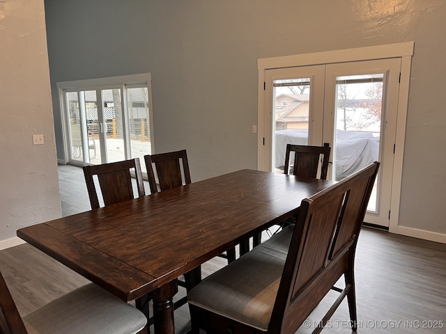 dining area with wood-type flooring