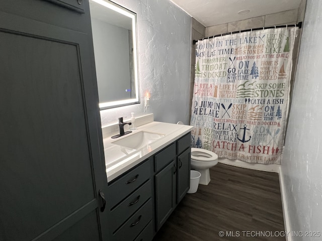 full bathroom with toilet, vanity, shower / bath combination with curtain, and hardwood / wood-style flooring