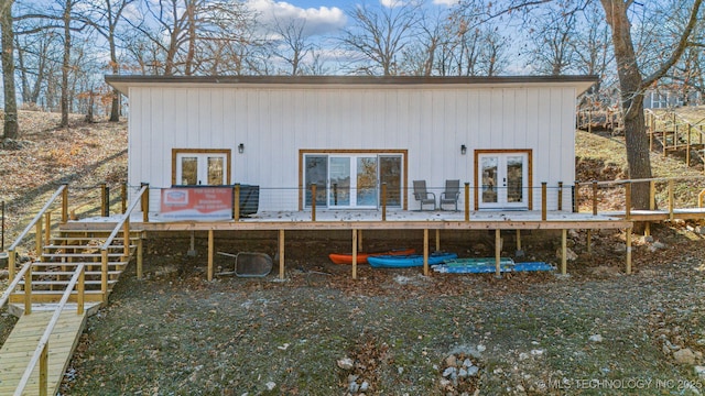 back of property with french doors and a deck