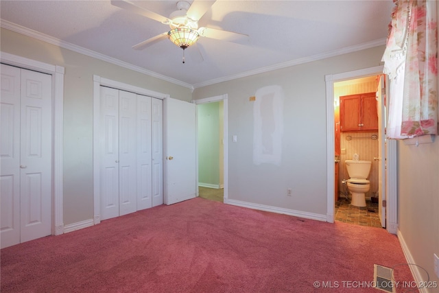 unfurnished bedroom with multiple closets, ceiling fan, crown molding, ensuite bathroom, and light carpet