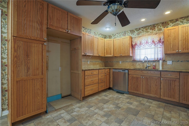 kitchen with ceiling fan, sink, and stainless steel dishwasher