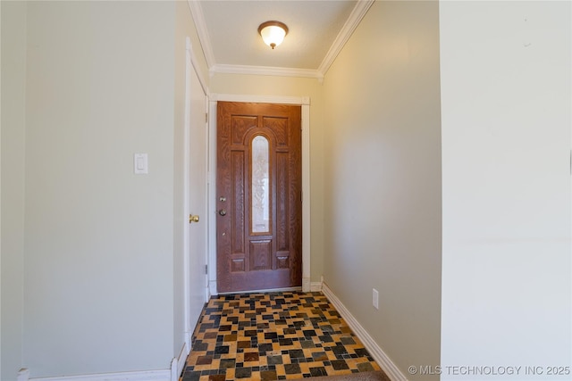 entrance foyer featuring ornamental molding