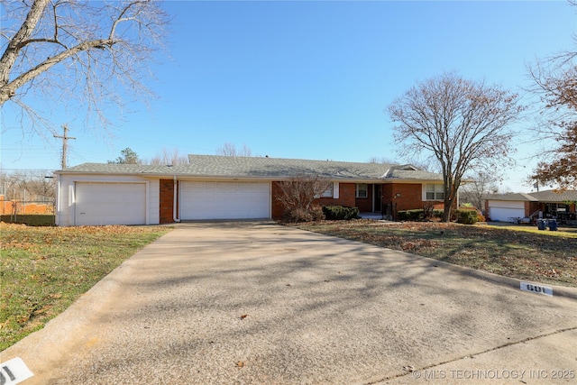 single story home featuring a garage