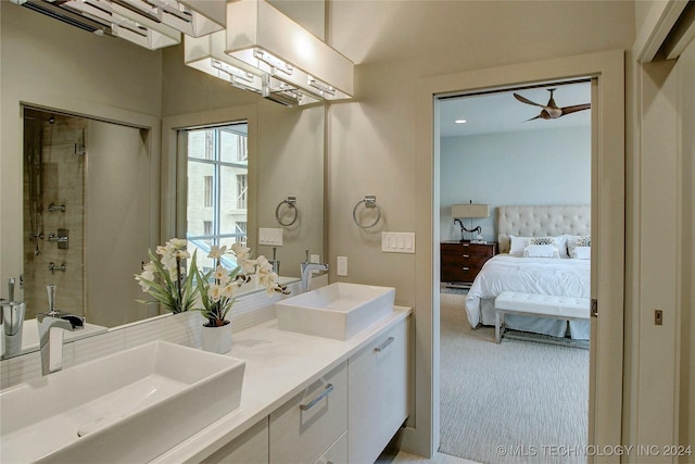 bathroom with ceiling fan and vanity