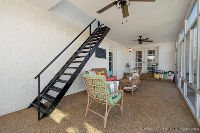 interior space featuring ceiling fan and french doors