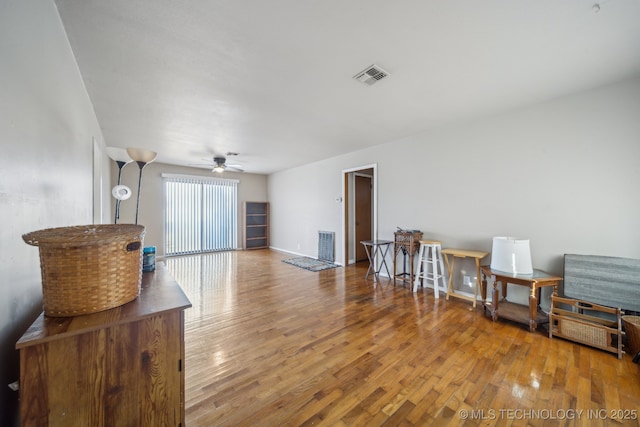 miscellaneous room with hardwood / wood-style floors and ceiling fan