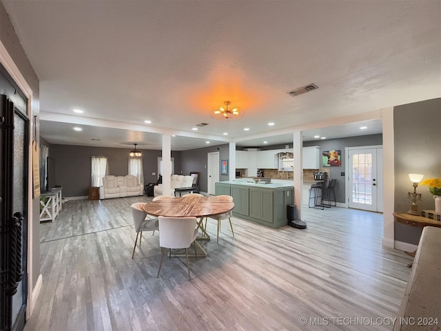 dining area featuring light hardwood / wood-style flooring