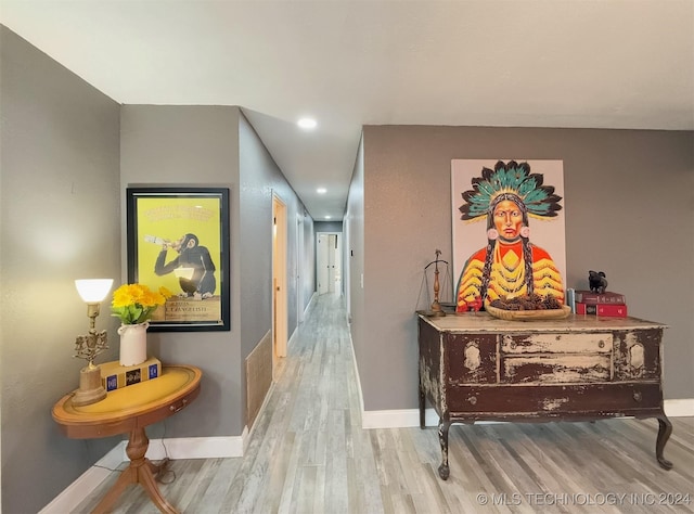 hallway featuring wood-type flooring