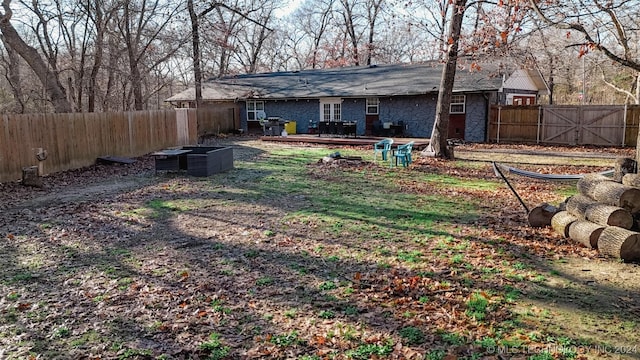 view of yard featuring a wooden deck