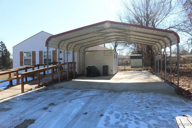 view of vehicle parking featuring a carport