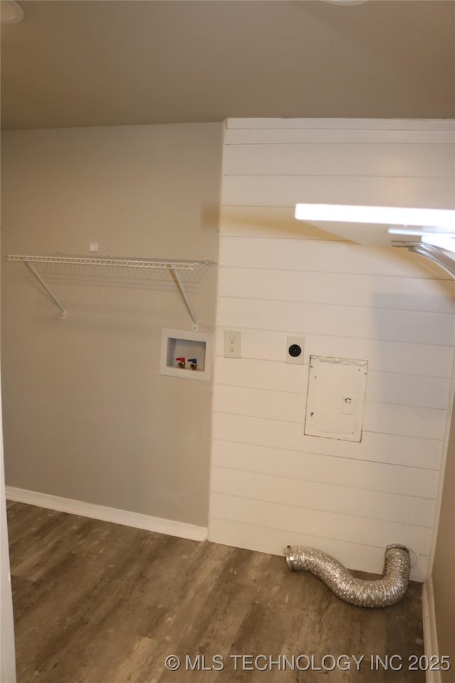 laundry room with dark wood-type flooring, washer hookup, and electric dryer hookup