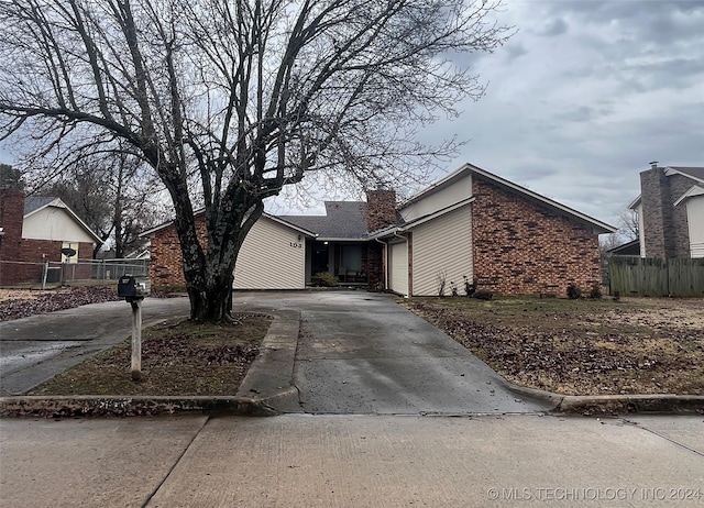 view of side of property featuring a garage