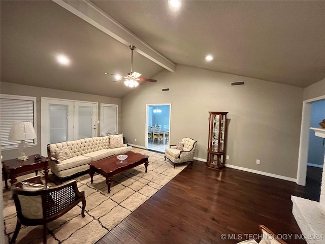 living room with ceiling fan, a fireplace, lofted ceiling with beams, and hardwood / wood-style flooring