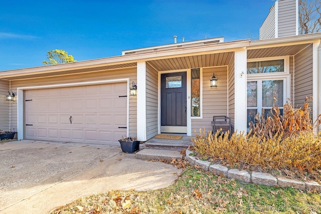 property entrance with a garage