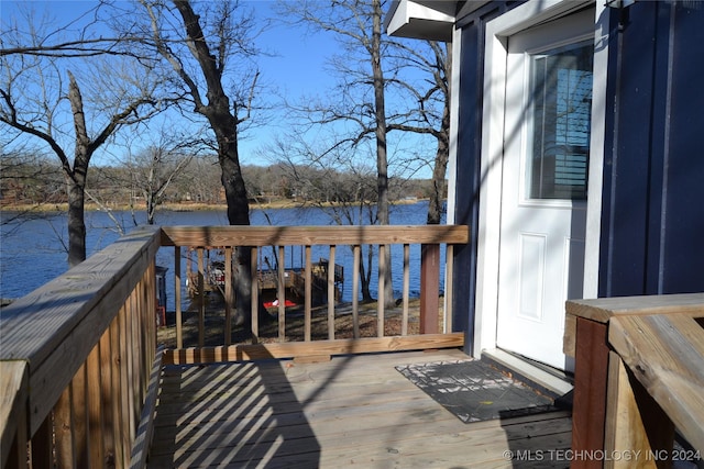 deck featuring a water view