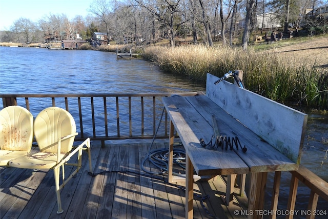 view of dock featuring a water view