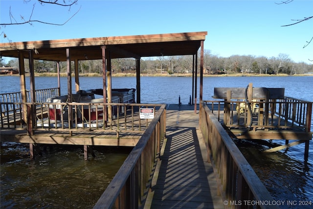 view of dock with a water view