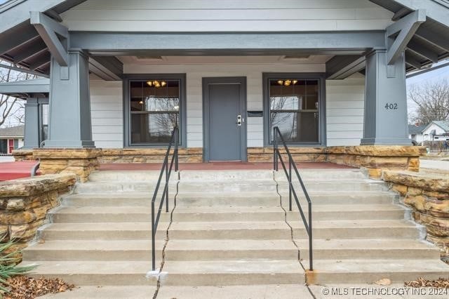 property entrance with a porch