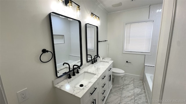 bathroom with vanity, toilet, walk in shower, and ornamental molding