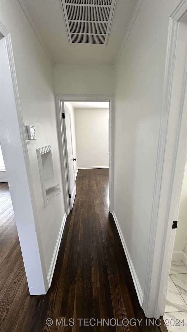 hallway with ornamental molding