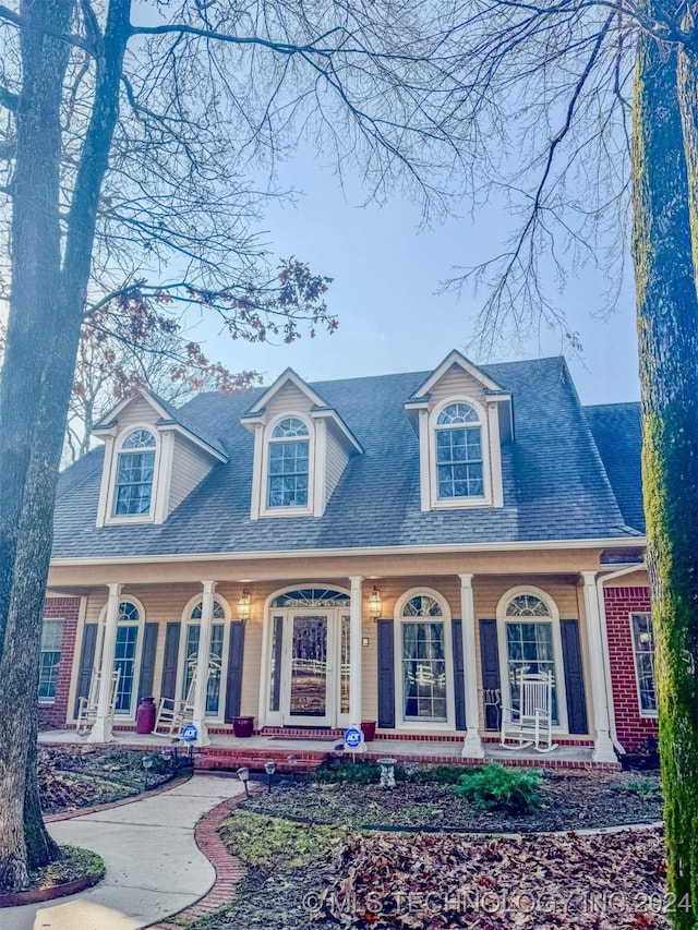 view of new england style home