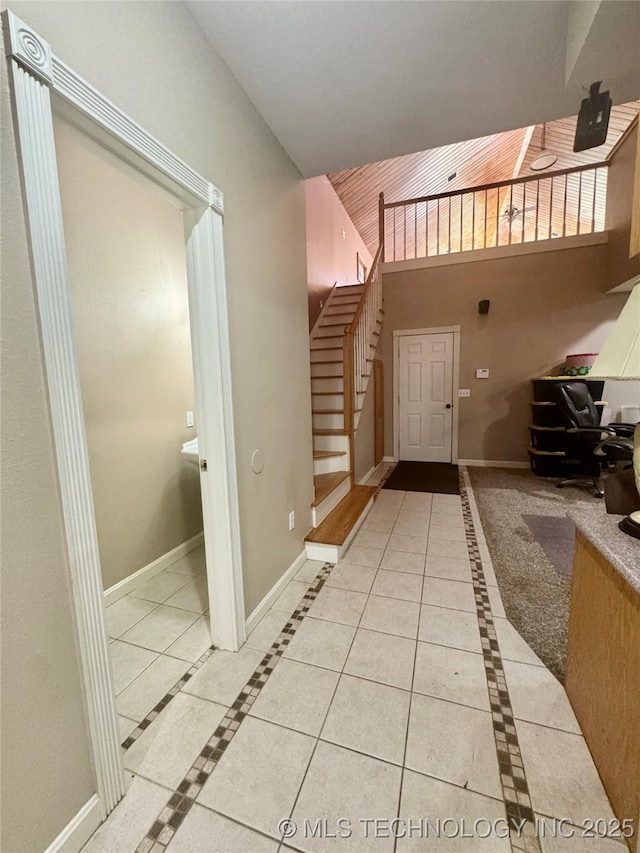 foyer with light tile patterned flooring