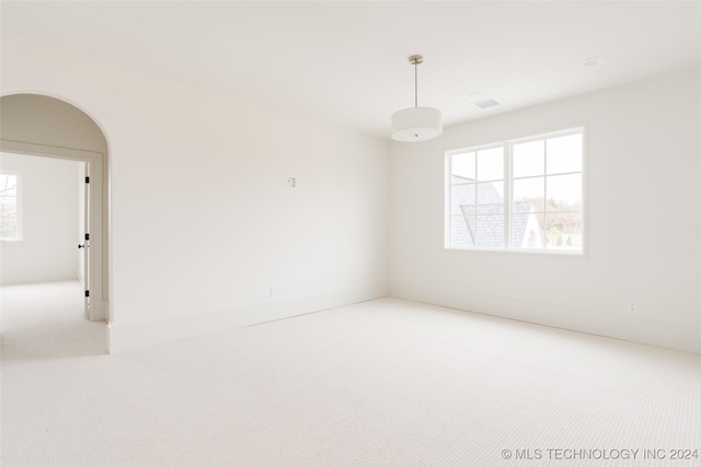 empty room featuring carpet floors