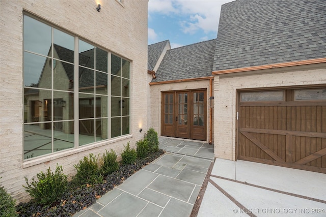 doorway to property with french doors