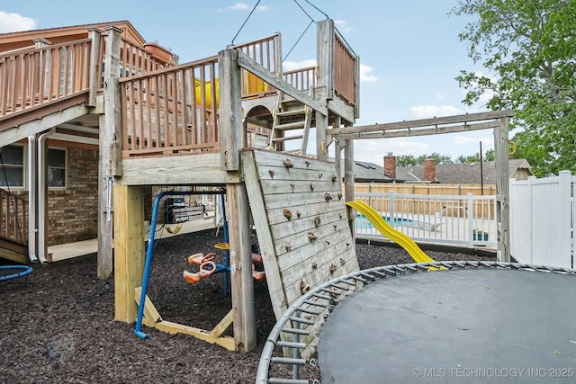 view of jungle gym featuring a deck