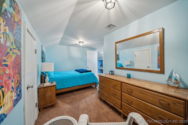 bedroom featuring light carpet and lofted ceiling