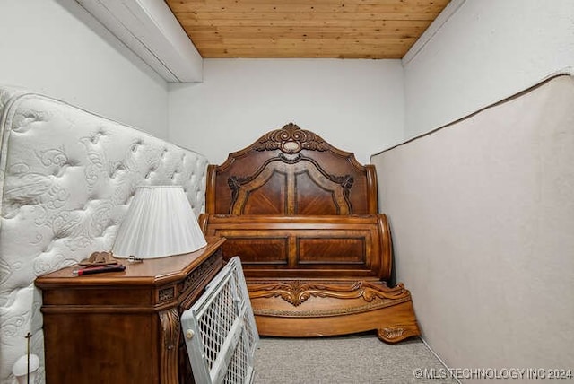 room details featuring carpet and wood ceiling