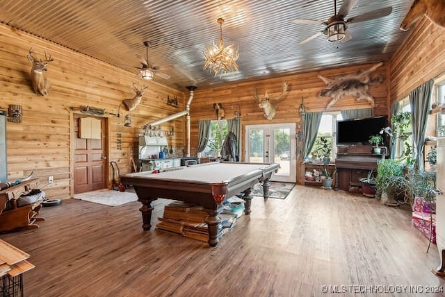 playroom featuring hardwood / wood-style flooring, french doors, ceiling fan with notable chandelier, and pool table