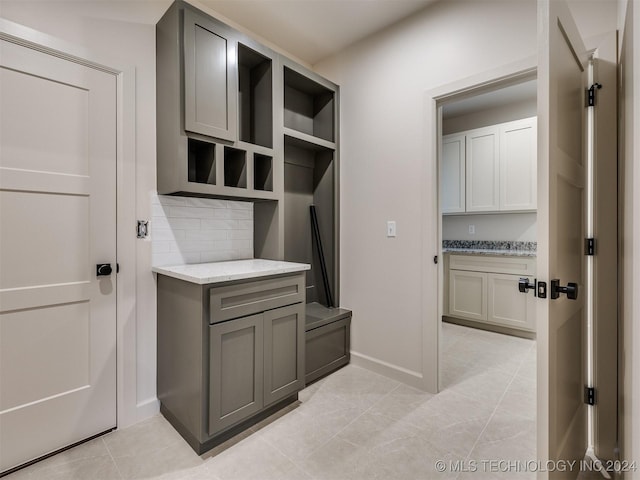 mudroom featuring light tile patterned flooring