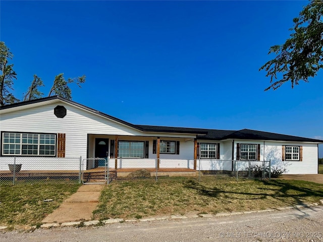 ranch-style house with covered porch