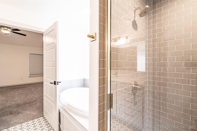 full bathroom featuring a tub to relax in, a stall shower, and a ceiling fan